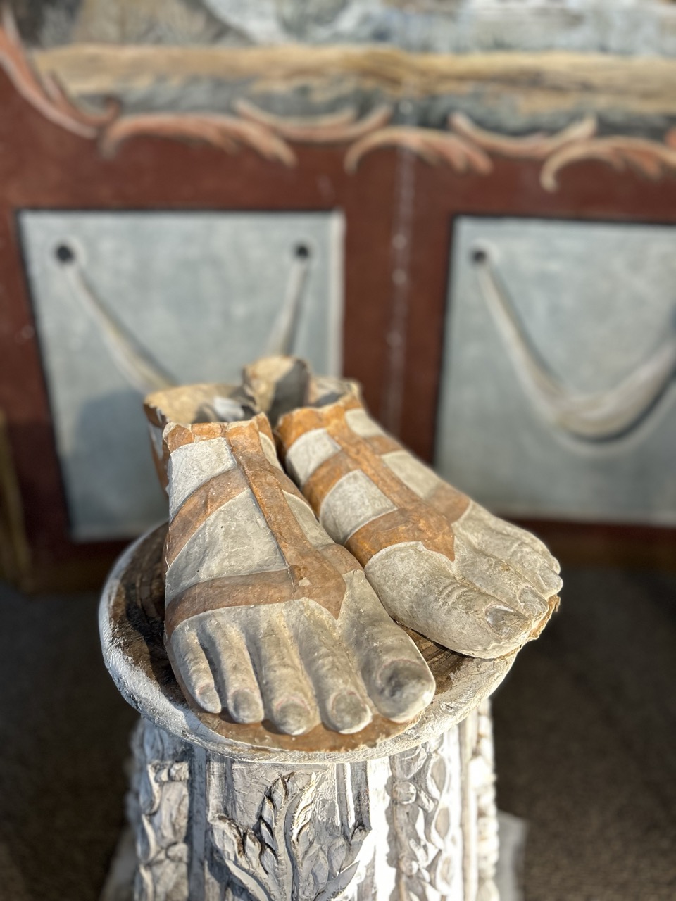 "Pair of feet in sandals, papier maché theater costume" Yveline